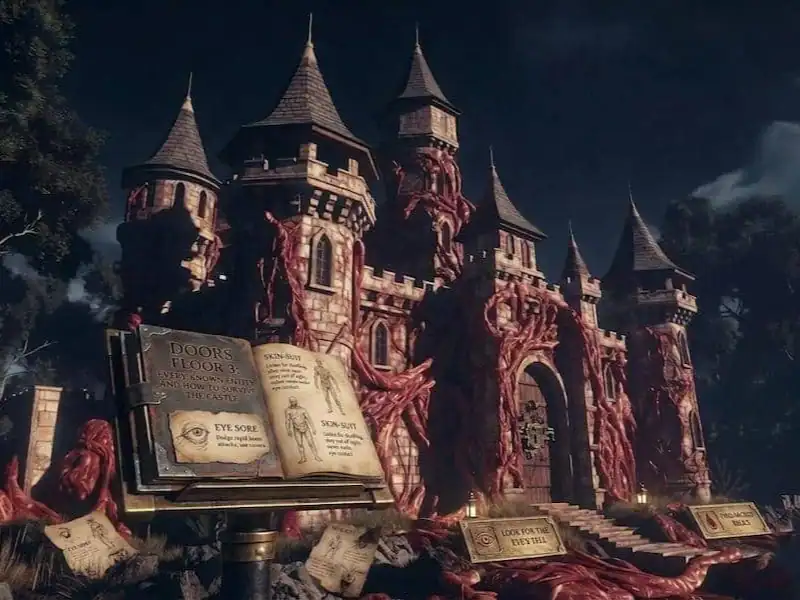 Haunted castle themed attraction with an open book display in front, set against a dark sky, creatin.