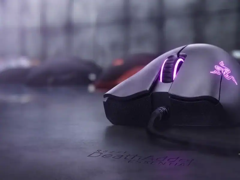 Razer DeathAdder Essential gaming mouse with customizable RGB lighting.